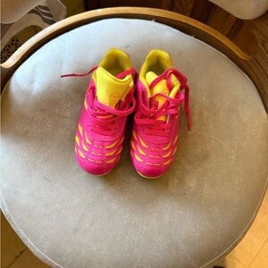 Kids Pink and Yellow outdoor soccer cleats